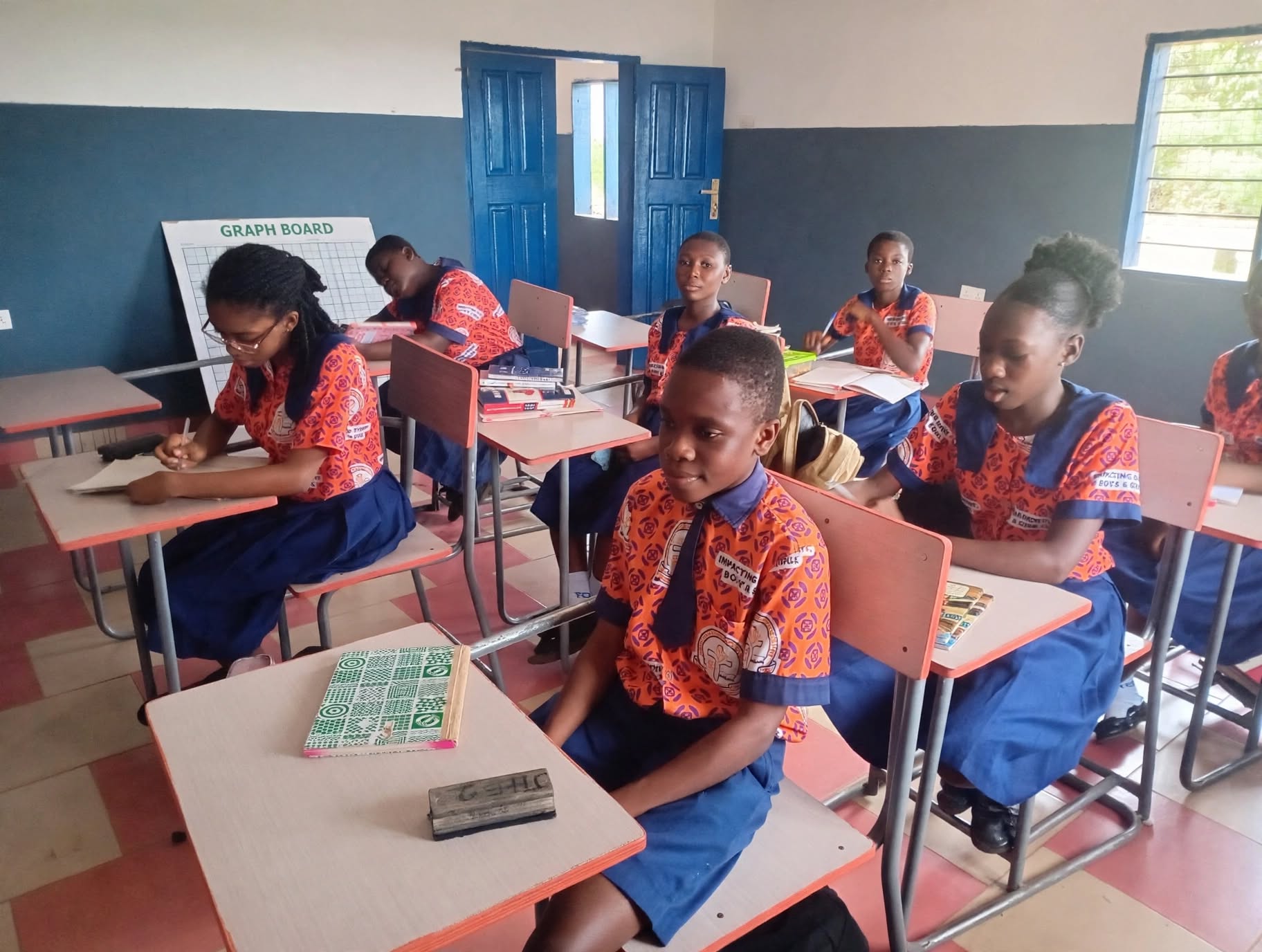 Young learners share a moment together in class